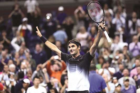 Switzerlandu2019s Roger Federer celebrates after defeating Frances Tiafoe of the US during the US Open in New York Tuesday night. (AFP)
