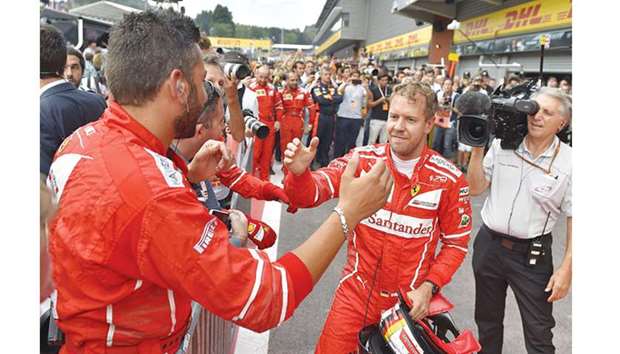 Ferrari driver Sebastian Vettel (right) finished second behind Mercedes driver Lewis Hamilton in the Belgian Grand Prix at the Spa-Francorchamps circuit on Sunday. (AFP)