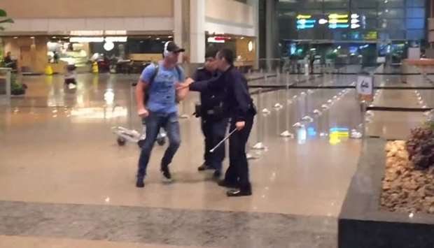 Drunk Australian assaults police at Singapore Airport