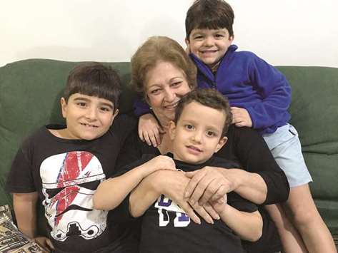 Ivonette Balthazar poses with three of her five grandchildren. The 67-year-old Brazilian woman is slowly getting better after receiving a donated heart from the coach of Germanyu2019s canoe slalom team after he died in a car accident during the Olympic Games in Rio de Janeiro in 2016.