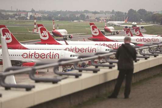 Passenger aircraft, operated by Air Berlin, stand on the tarmac at Tegel airport in Berlin. Hans Rudolf Woehrl, the aviation entrepreneur who sold various carriers to Air Berlin in the past, said yesterday that he has not taken up the insolvency administratoru2019s invitation to enter at the data room set up for potential bidders and wonu2019t do so for the time being. That makes an offer unlikely by the September 15 deadline.