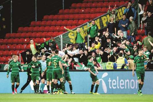 Celtic players celebrate James Forrestu2019s goal during the UEFA Champions League, third qualifying round, second leg match against Rosenborg in Trondheim, Norway.