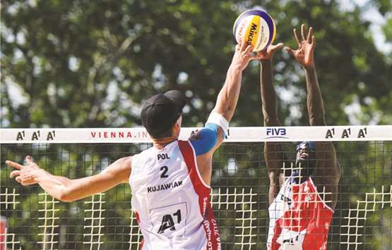 Qataru2019s Jefferson Pereira and Cherif Younousse defeated Kacper Kujawiak and Mariusz Prudel of Poland.