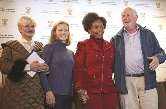 Catherine McGowan (second left) with Minister Nkoana-Mashabane, Malcolm McGowan, and Sue Peisier, Stephen McGowanu2019s mother-in-law, after the media briefing in Pretoria.