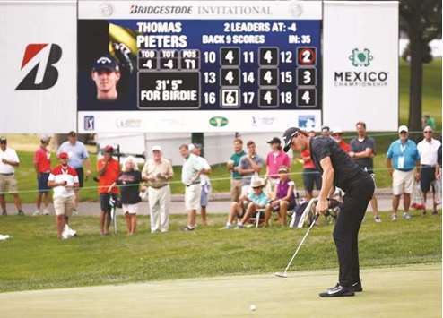 Thomas Pieters of Belgium putts on the ninth green during the first round of the World Golf Championships Bridgestone Invitational in Akron, Ohio, on Thursday. (AFP)