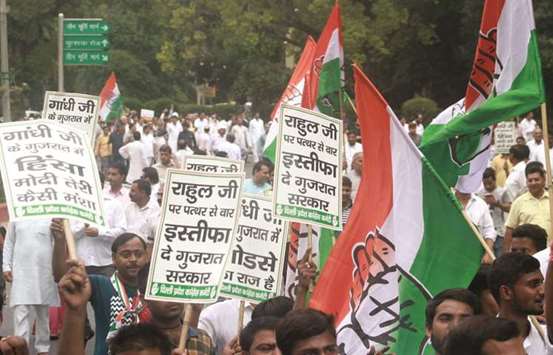 Congress workers stage a demonstration in protest against the attack on party vice president Rahul Gandhi, in New Delhi yesterday.
