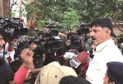 Karnataka Energy Minister D K Shivakumar speaks to press at his residence after Income Tax department raids in Bengaluru yesterday.
