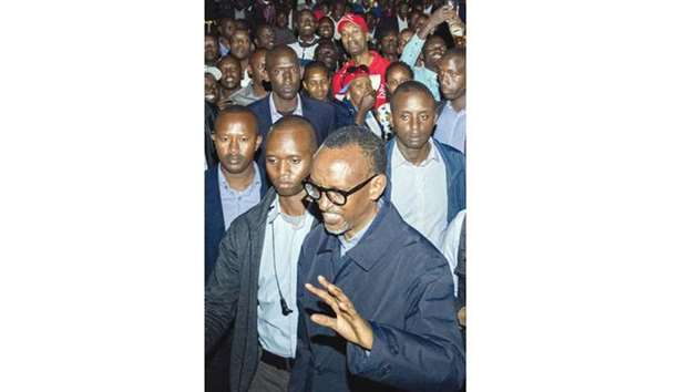 Kagame acknowledges supporters yesterday while celebrating his reelection at the Rwandan Patriotic Front headquarters in Kigali.