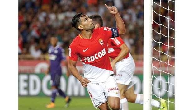 Monacou2019s Radamel Falcao celebrates scoring their second goal.