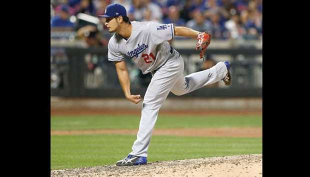 Los Angeles Dodgers starting pitcher Yu Darvish pitches against New York Mets in the seventh inning at Citi Field.