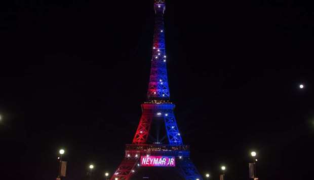 The would-be intruder was wearing a Paris Saint-Germain football shirt and at the time of the incident the tower was lit up with the team colours of PSG.