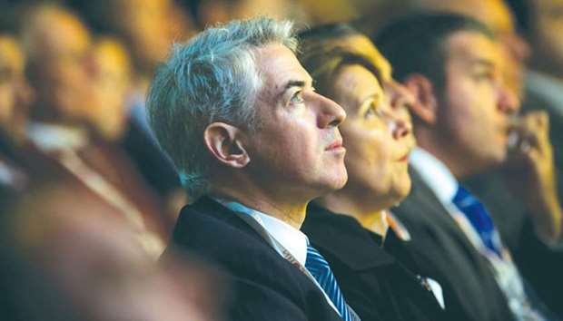 William Ackman, founder and CEO of Pershing Square Capital Management (centre), listens during a conference in New York. The 51-year-old activist investor said he would seek minority representation on Automatic Data Processingu2019s 10-member board. ADP said earlier that Ackman wanted five board directors, including a seat for himself.