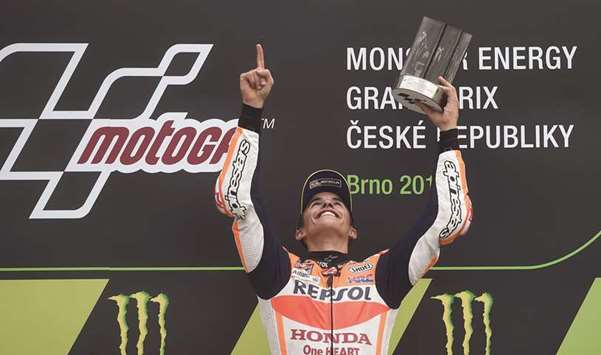 Honda's Spanish rider Marc Marquez celebrates on the podium after winning the MotoGP of the Czech Republic in Brno yesterday. (AFP)