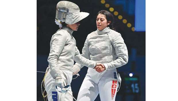 Tunisian sabre fencer Azza Besbes (right) beat Italyu2019s Irene Vecchi in the semi-final for a spot in the decider at the 2017 FIE World Fencing Championship in Leipzig, Germany.