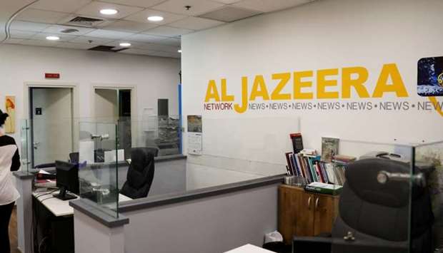 Inside an office of Qatar-based Al-Jazeera network in Jerusalem