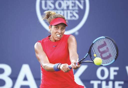 Madison Keys returns a shot to Garbine Muguruza during their Bank of the West Classic semi-final in Stanford, California, on Saturday. (AFP)
