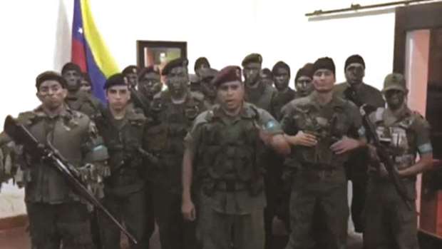 A still image from video released by Operation David Carabobo purportedly shows a group of men in military uniforms announcing an uprising in Valencia, Venezuela.