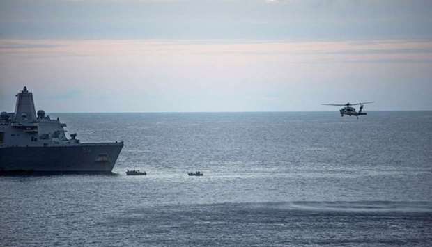 Search efforts for three US Marines missing after their MV-22 Osprey tilt-rotor aircraft crashed into the sea off Australia's northeast coast.