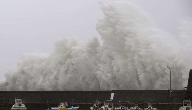 A big wave caused by Typhoon Noru crashes on a breakwater in Aki, Kochi Prefecture, Japan in this photo taken by Kyodo.