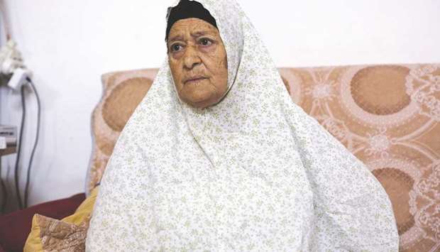 Fahamiya Shamasneh sits in her family house in the annexed east Jerusalem neighbourhood of Sheikh Jarrah.