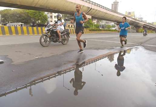 In this photograph taken on July 30, Samir Singh is seen running in Mumbai.