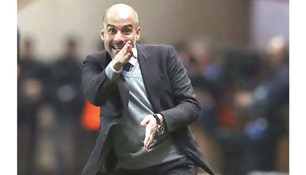 File picture of Manchester Cityu2019s Spanish manager Pep Guardiola reacting during a UEFA Champions League match.