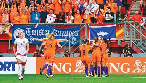 File picture of Netherlandsu2019 forward Vivianne Miedema (2nd R) celebrating with teammates after scoring a goal during the UEFA Womenu2019s Euro 2017 final.