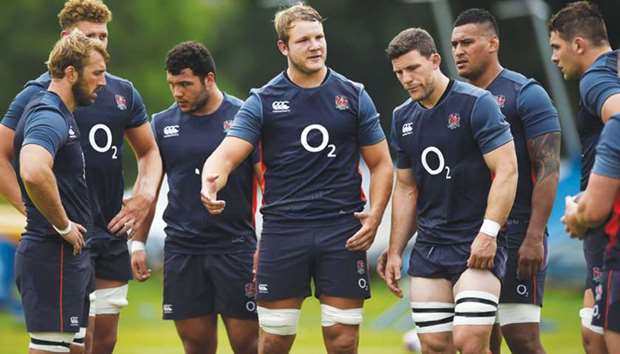 England rugby teamu2019s Joe Launchbury (centre) talks during a training session in London yesterday. (Reuters)