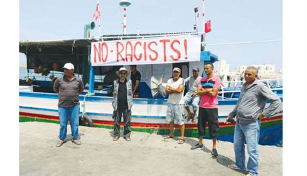Tunisian fishermen demonstrate yesterday in the port of Zarzis in southeastern Tunisia.