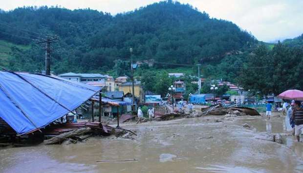 According to witnesses in Yen Bai province, floods tore through villages on Thursday night, carrying with them large boulders from the mountains.
