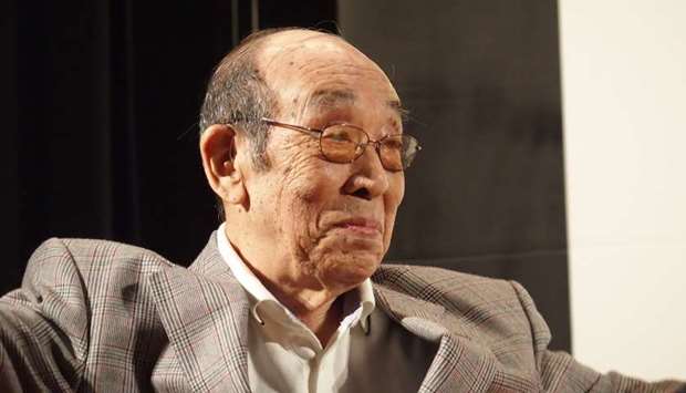 Haruo Nakajima at an event in Tokyo.  March 2015 photo by Brett Homenick, author of blog 'Sidelong Glances of a Pigeon Kicker'.