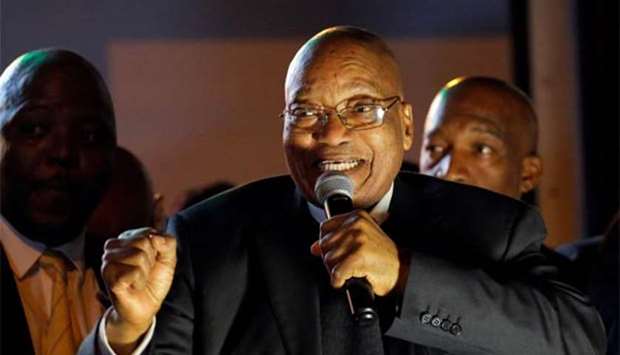 South African President Jacob Zuma addresses his supporters after he survived a no-confidence motion in Cape Town on Tuesday.