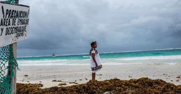 A local is seen in Tulum beach in Quintana Roo, Mexico, before the arrival of Tropical Storm Franklin.