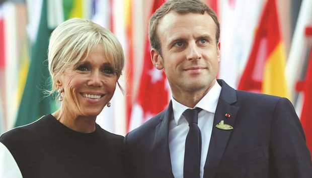 Macron and his wife Brigitte.