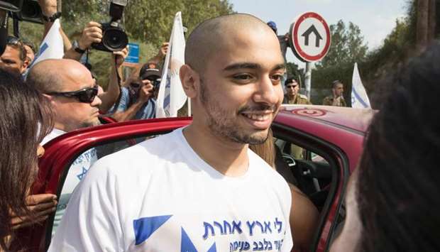 Israeli soldier Elor Azaria, who was convicted of manslaughter and sentenced to 18 months imprisonment for killing a wounded and incapacitated Palestinian assailant, arrives at the Trsifin military prison in Rishon Lezion