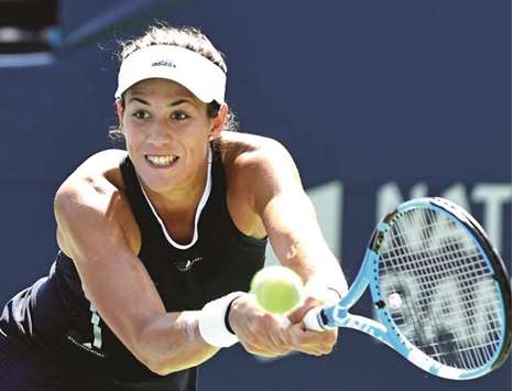 Garbine Muguruza of Spain plays a shot during her win over Kirsten Flipkens of Belgium at the Rogers Cup in Toronto. (USA TODAY Sports)
