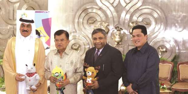 Indonesiau2019s Vice President Jusuf Kalla, Qataru2019s ambassador to Indonesia Ahmed bin Jassim al-Hamar and the president of the Indonesian Asian Games 2018 Organising Committee Erick Thohir at Qatar Airways sponsorship signing ceremony in Jakarta yesterday.