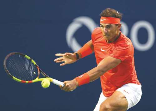 Rafael Nadal of Spain plays a backhand during his win over Benoit Paire of France at the Toronto Masters. (AFP)