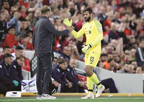 Liverpool manager Jurgen Klopp splashed 65.2mn to sign Alisson Becker (right) from Roma, in a short-lived world-record fee for a goalkeeper. (Reuters)