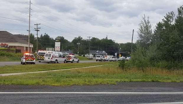 Emergency vehicles are seen at the Brookside Drive area in Fredericton, Canada August 10, 2018 in this picture obtained from social media.