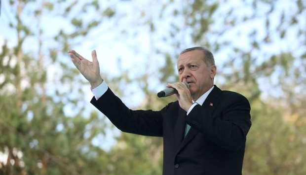 Turkish President Tayyip Erdogan addresses his supporters in Bayburt
