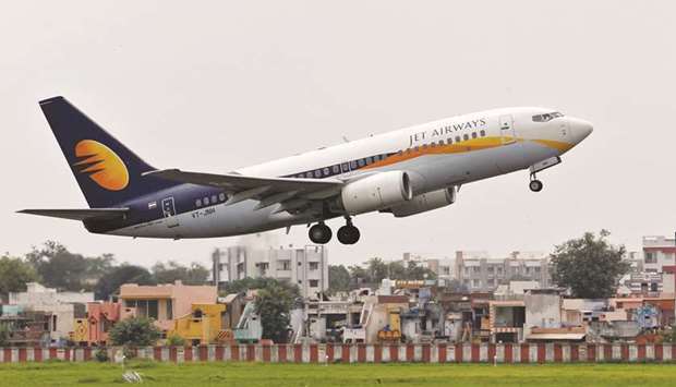 A Jet Airways passenger aircraft takes off from the airport in the western Indian city of Ahmedabad. The airline needs to repay about Rs30bn ($436mn) of loans and bonds over the next three years with a third of it due by the end of next year, Reuters data shows.