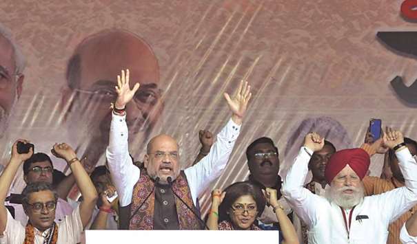 BJP chief Amit Shah gestures as he speaks at a rally in Kolkata yesterday.