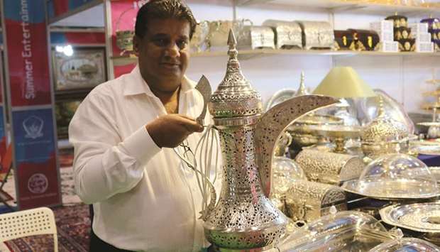 ARTISAN: The stall set up by Murad Noor Ali offers different kinds of German silverware with carvings done by hand.