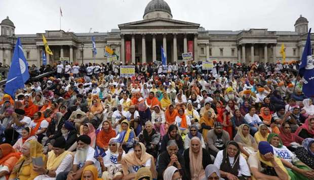 Members of the Sikh community gather to call for a referendum of the Sikh global community to establish India's Punjab state as an independent country, in Trafalgar Square in central London.