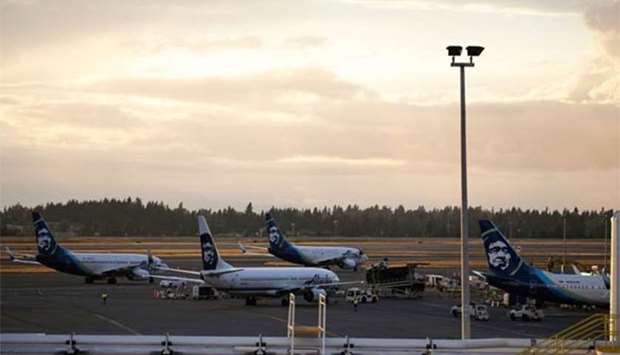 Alaska Airlines planes are pictured at Seattle-Tacoma International Airport the day after Horizon Air ground crew member Richard Russell took a plane from the airport in Seattle, Washington.