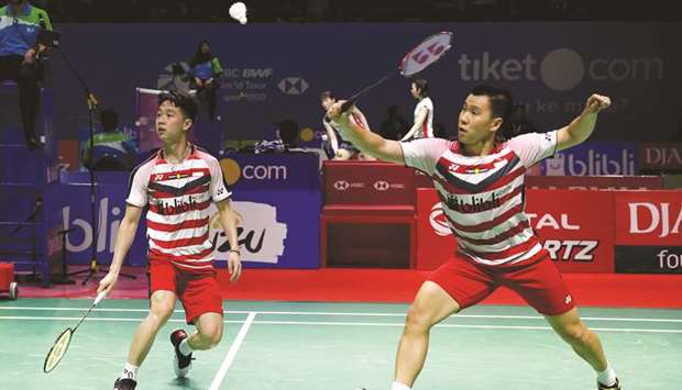Indonesiau2019s doubles players Marcus Fernaldi Gideon (right) and Kevin Sanjaya Sukamuljo in action during the Indonesia Open in Jakarta on July 6, 2018. (Reuters)