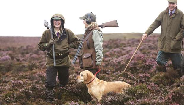 Members of a shooting party on Forneth Moor prepare to set off on the opening day of the grouse shooting season yesterday.
