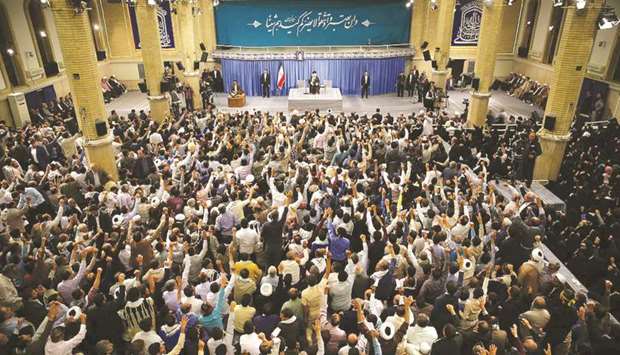 People listen to Ayatollah Ali Khamenei at an event in Tehran yesterday.