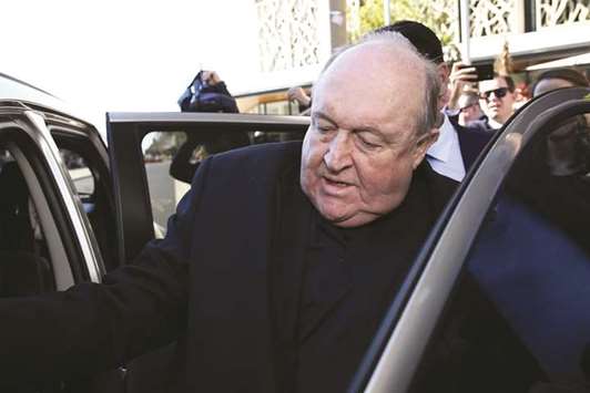 Former Australian archbishop Philip Wilson leaves a court in Newcastle yesterday.